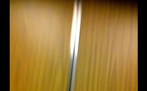 A guy locked out assuredly naked has to go in elevator to recover his clothes