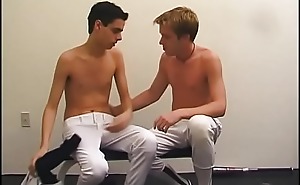 Blonde and brunette baseball studs suck each other's cocks and pound ass